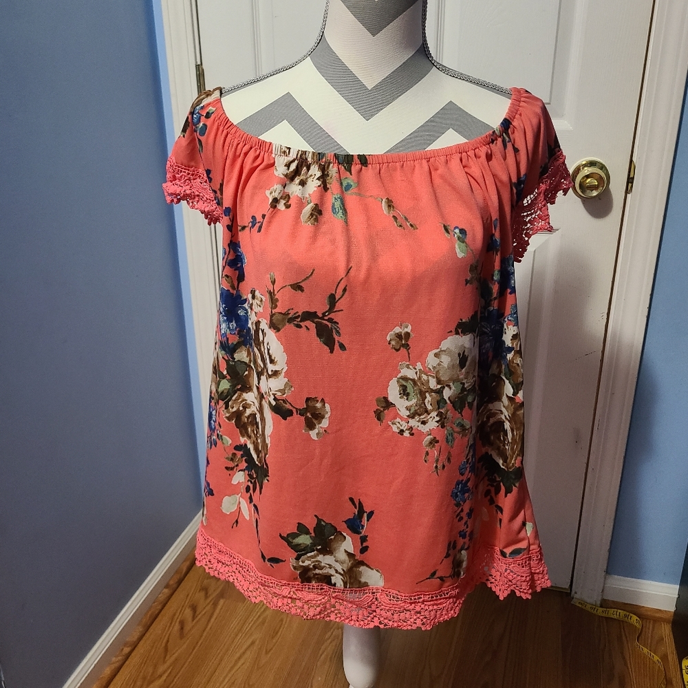 Coral floral top with lace edges